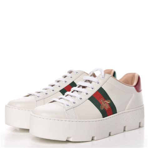 gucci calfskin sneakers black white|Gucci women's sneakers.